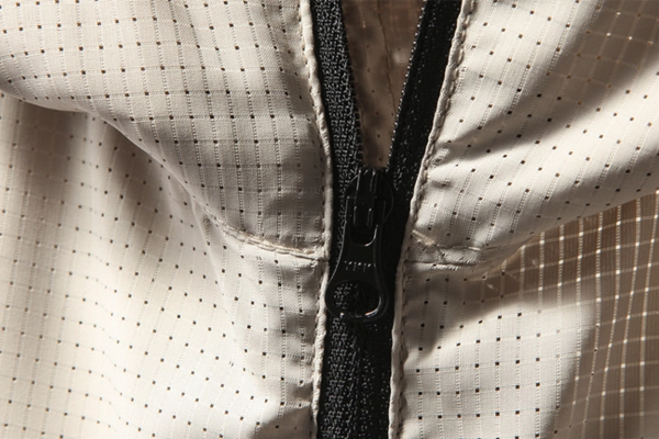 服裝布料透氣孔開孔設(shè)備——布料激光打孔機 服裝布料透氣孔開孔設(shè)備——布料激光打孔機